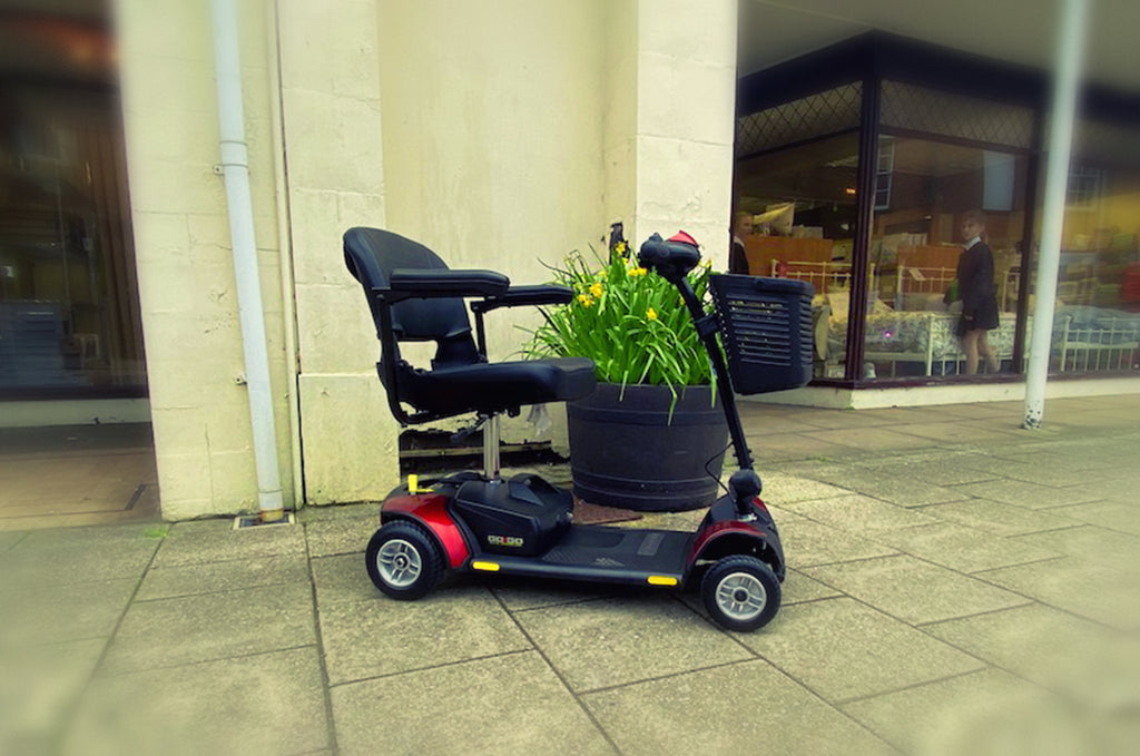 2016 Pride Go-Go Elite Traveller 4mph Transportable Mobility Boot Scooter in Red