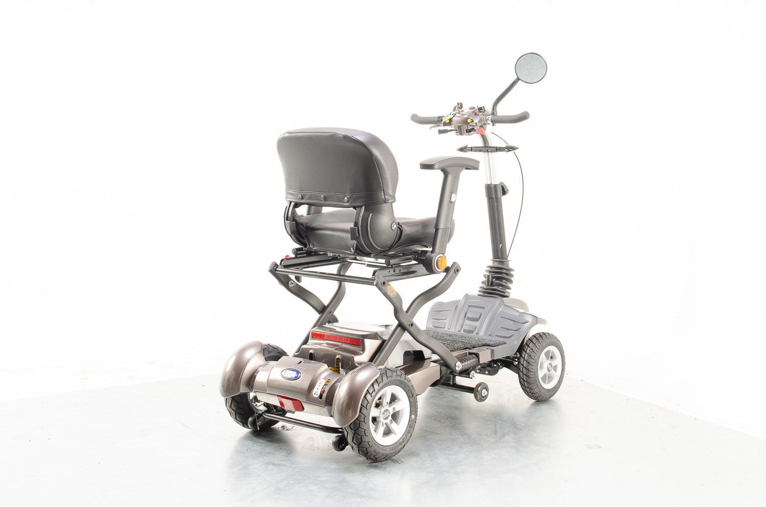 TGA Maximo Plus Used Mobility Scooter 4mph Folding Lithium Pneumatic Suspension bronze