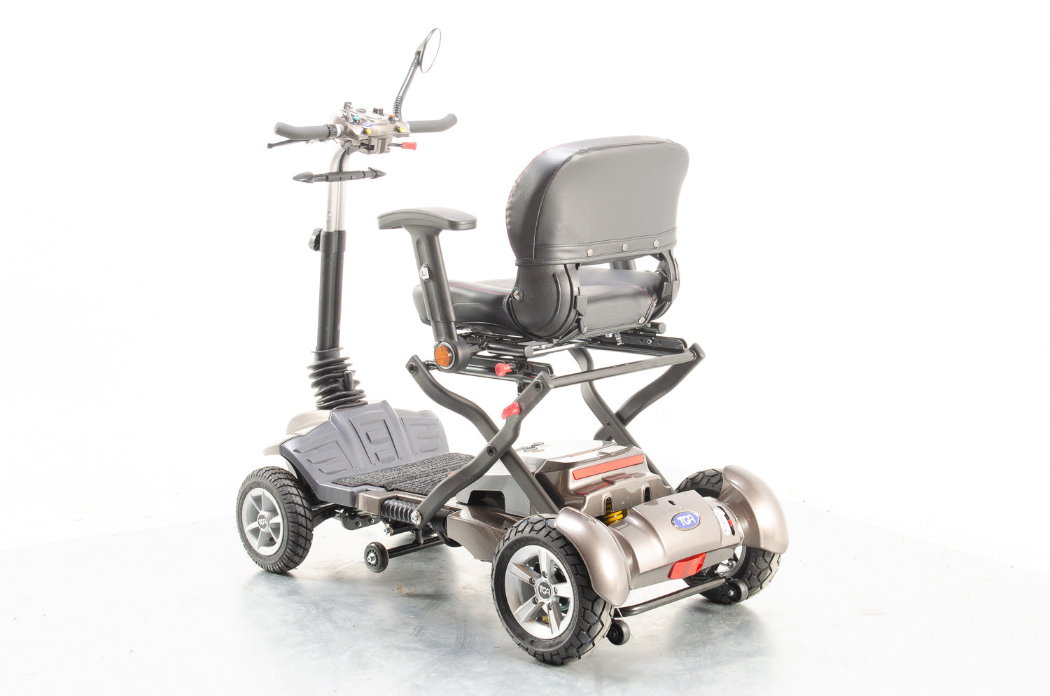 TGA Maximo Plus Used Mobility Scooter 4mph Folding Lithium Pneumatic Suspension bronze