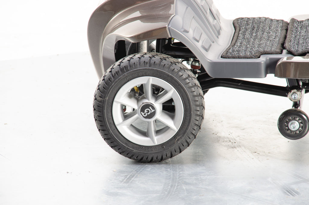 TGA Maximo Plus Used Mobility Scooter 4mph Folding Lithium Pneumatic Suspension bronze