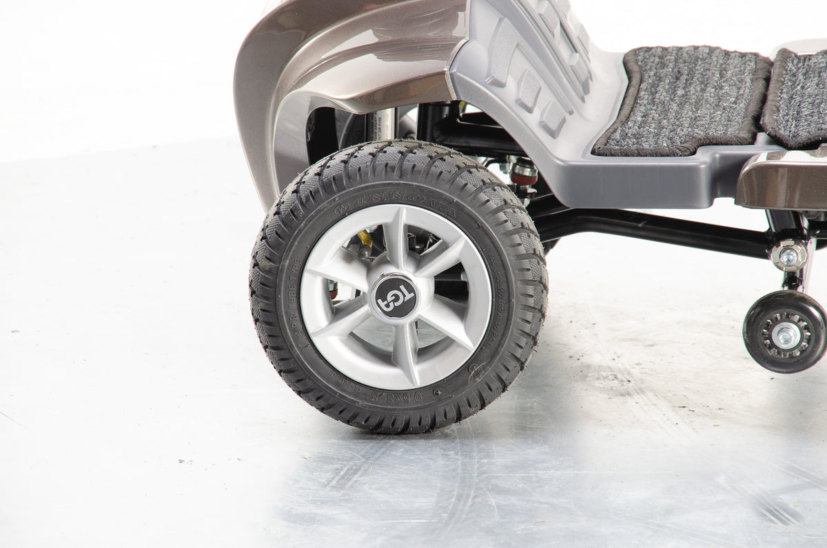 TGA Maximo Plus Used Mobility Scooter 4mph Folding Lithium Pneumatic Suspension bronze