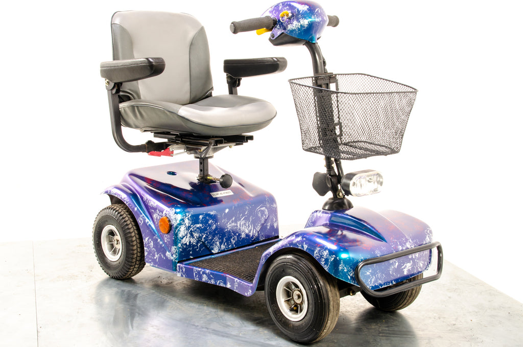 Rascal 388 S Used Electric Mobility Scooter Pavement Pneumatic Custom Blue Purple