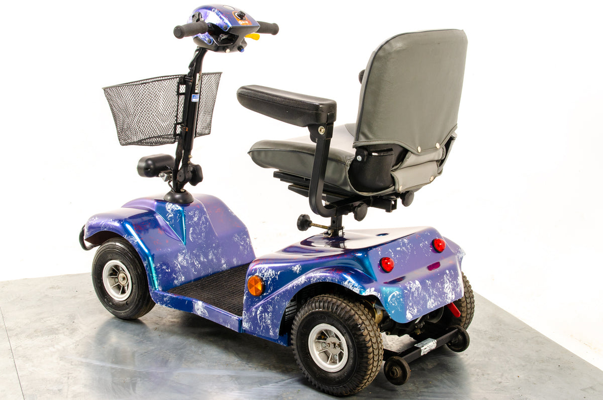 Rascal 388 S Used Electric Mobility Scooter Pavement Pneumatic Custom Blue Purple