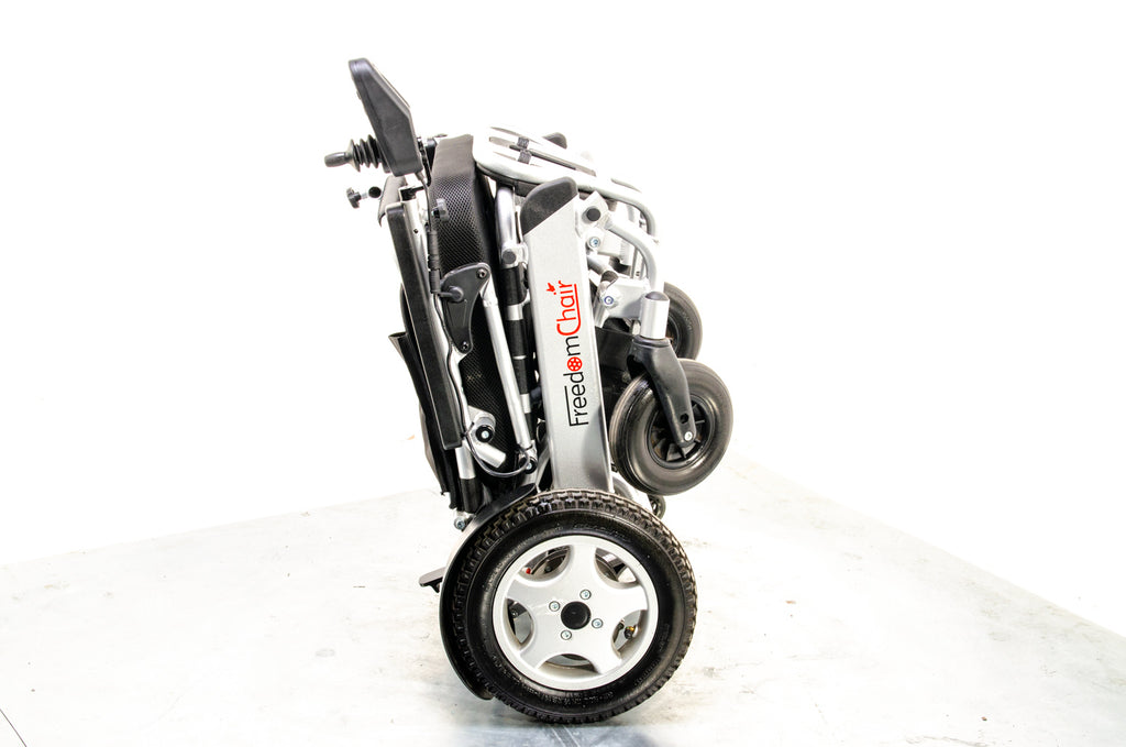 Freedom Chair A06L Used Electric Folding Wheelchair Powerchair Portable Transportable Lithium Aluminium Lightweight Attendant Brushless