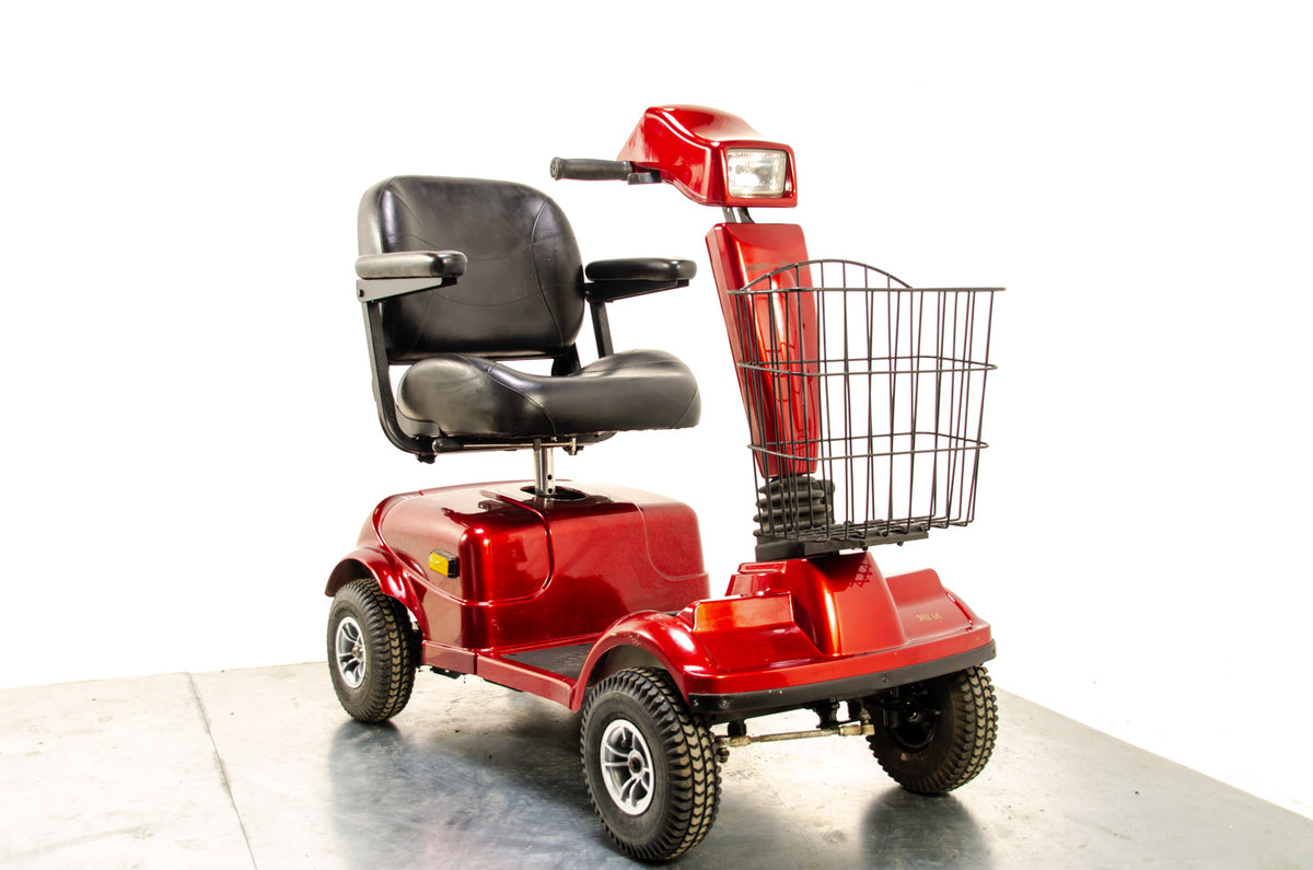 2006 Electric Mobility Rascal 302LE 6mph Used Mobility Scooter Road Pavement Red Main image