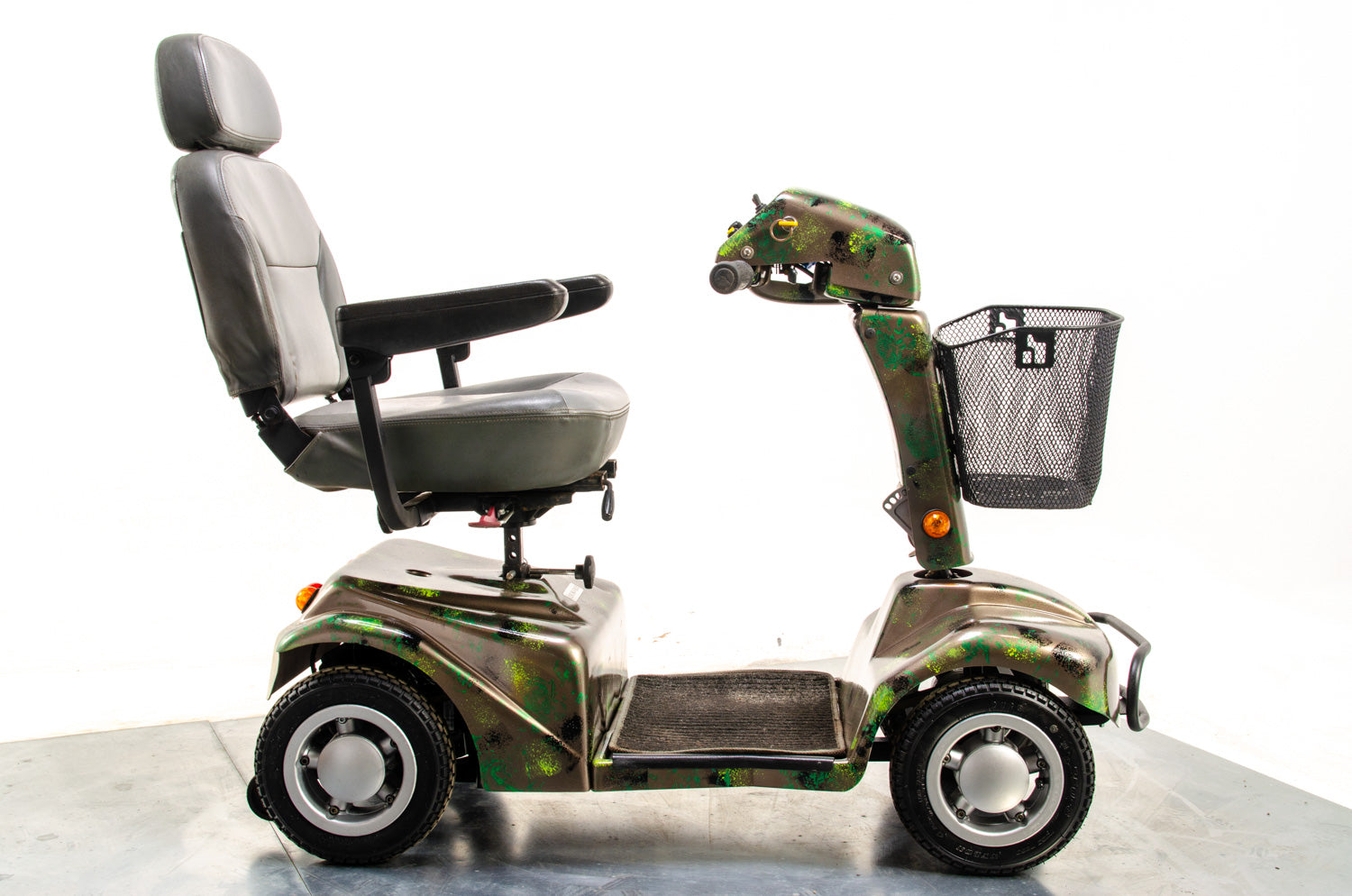 Rascal 388XL All-Terrain Used Electric Mobility Scooter 6mph Road Pavement Suspension Custom Camo