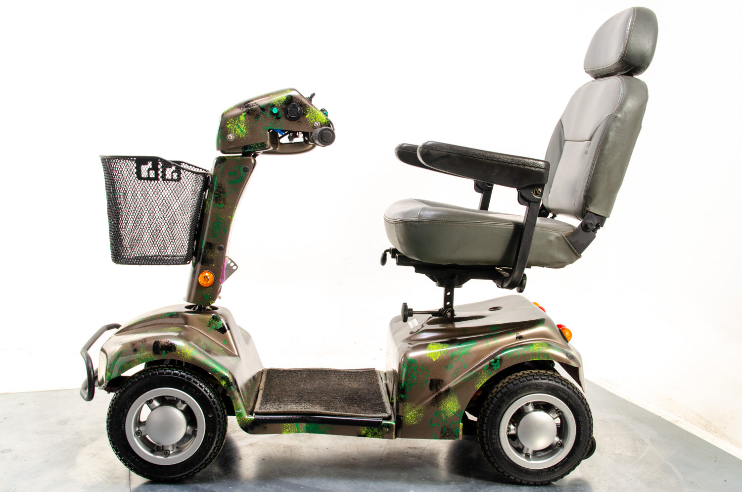 Rascal 388XL All-Terrain Used Electric Mobility Scooter 6mph Road Pavement Suspension Custom Camo