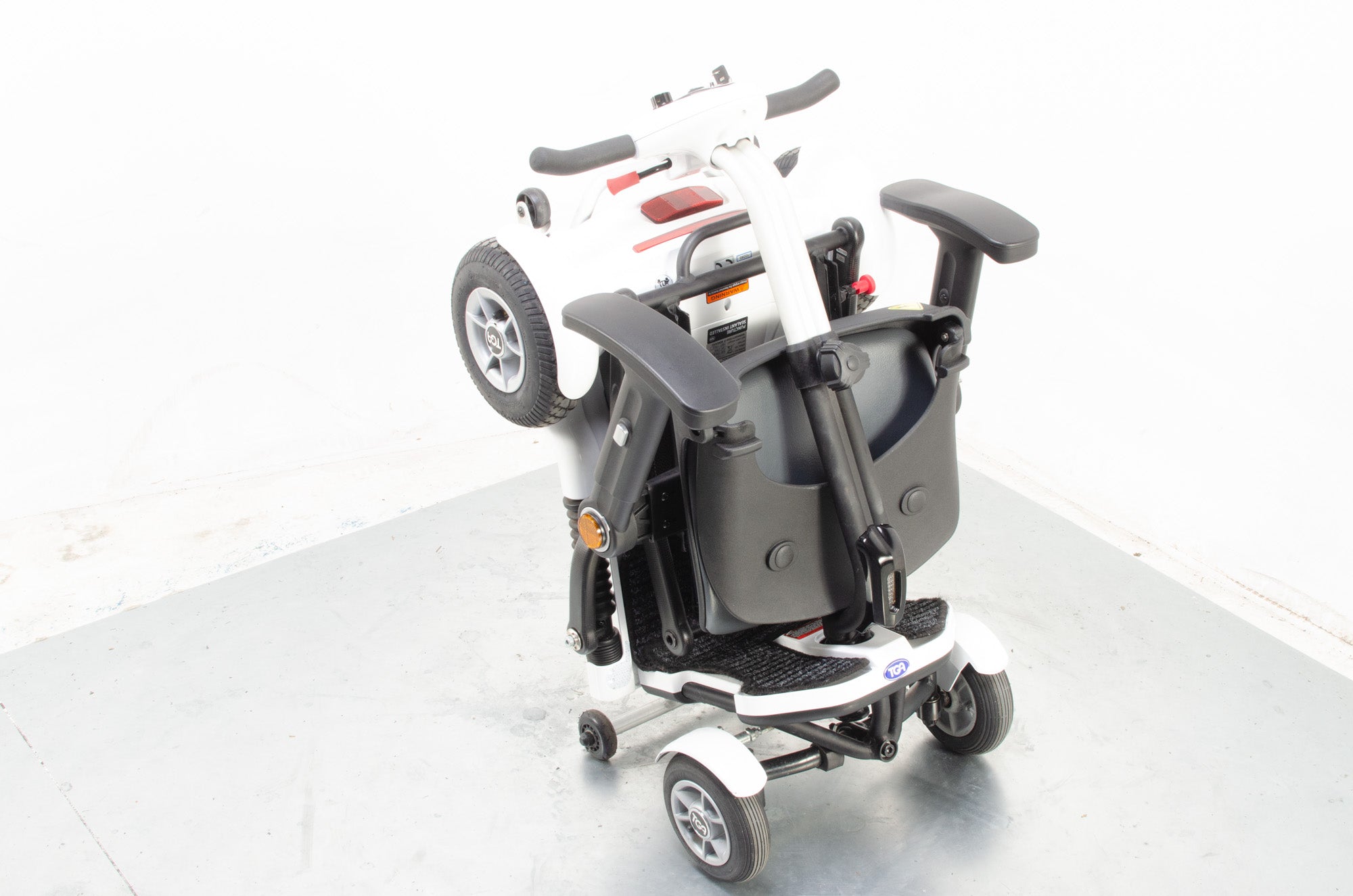 2018 TGA Minimo Plus 4 Compact Folding 4mph Electric Mobility Scooter in White