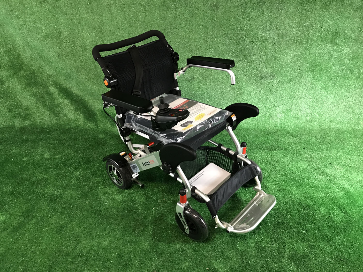 New Motion Healthcare Foldalite Folding Light Weight Powerchair - Electric Wheelchair