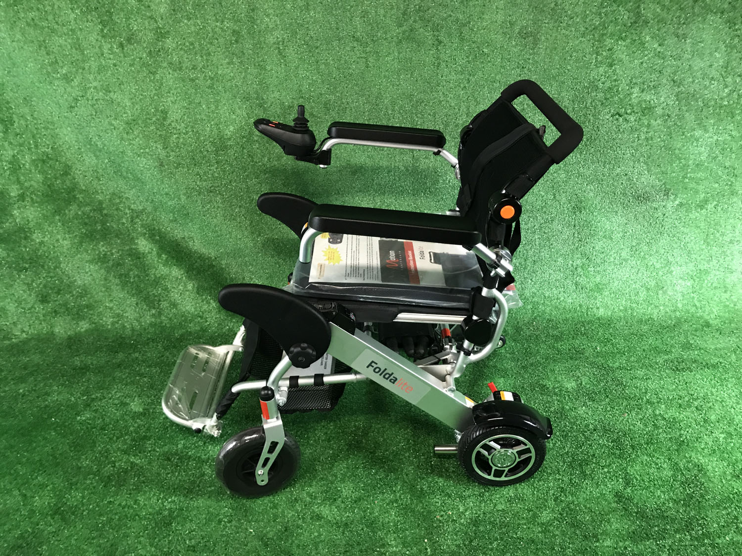 New Motion Healthcare Foldalite Folding Light Weight Powerchair - Electric Wheelchair