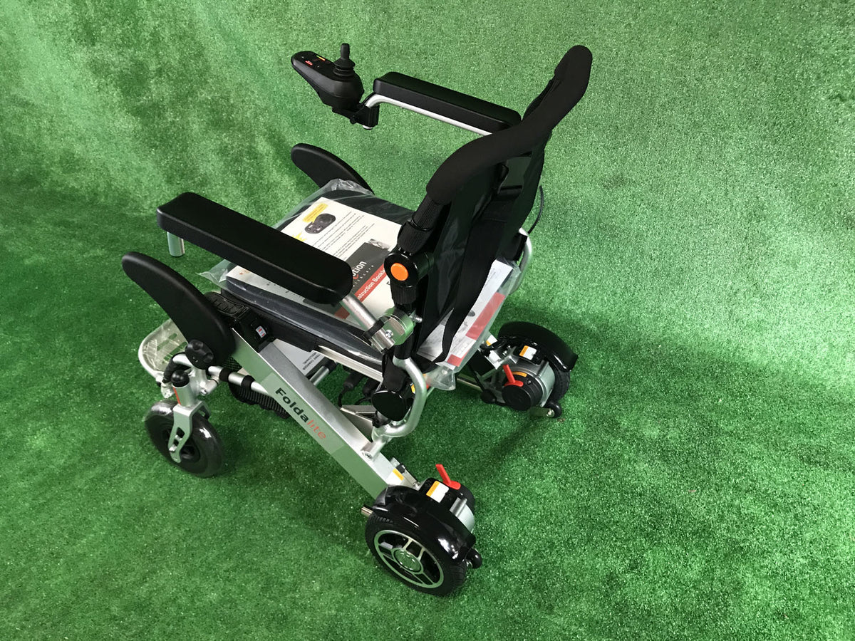 New Motion Healthcare Foldalite Folding Light Weight Powerchair - Electric Wheelchair