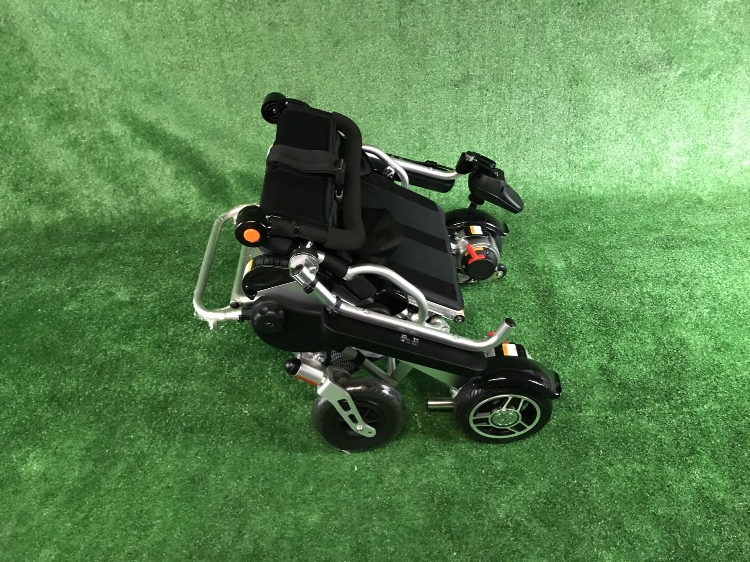 New Motion Healthcare Foldalite Folding Light Weight Powerchair - Electric Wheelchair